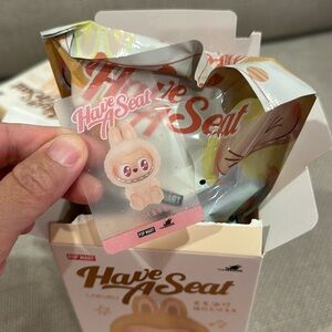 Labubu have a seat Dada